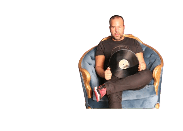 DJ Baruch holding a vinyl record